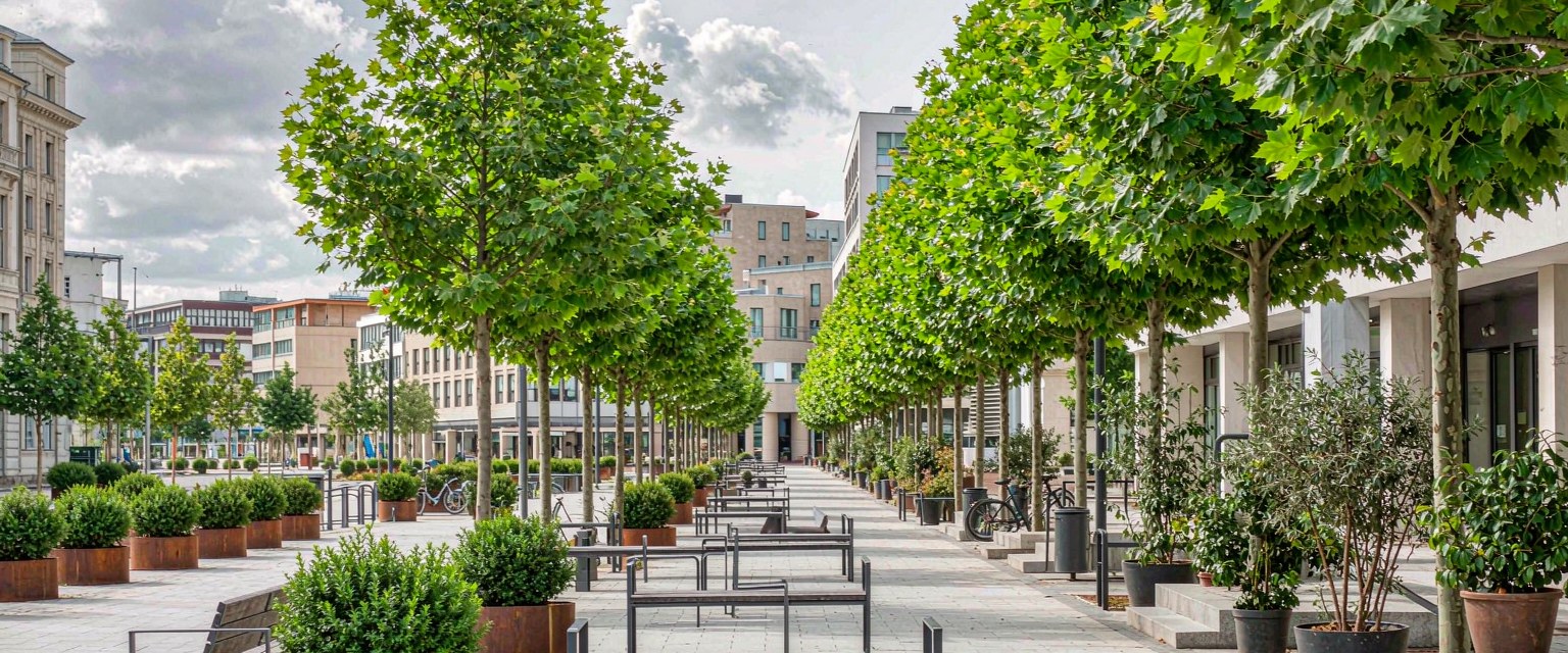 Modern city streetscape with AOTUDE outdoor furniture